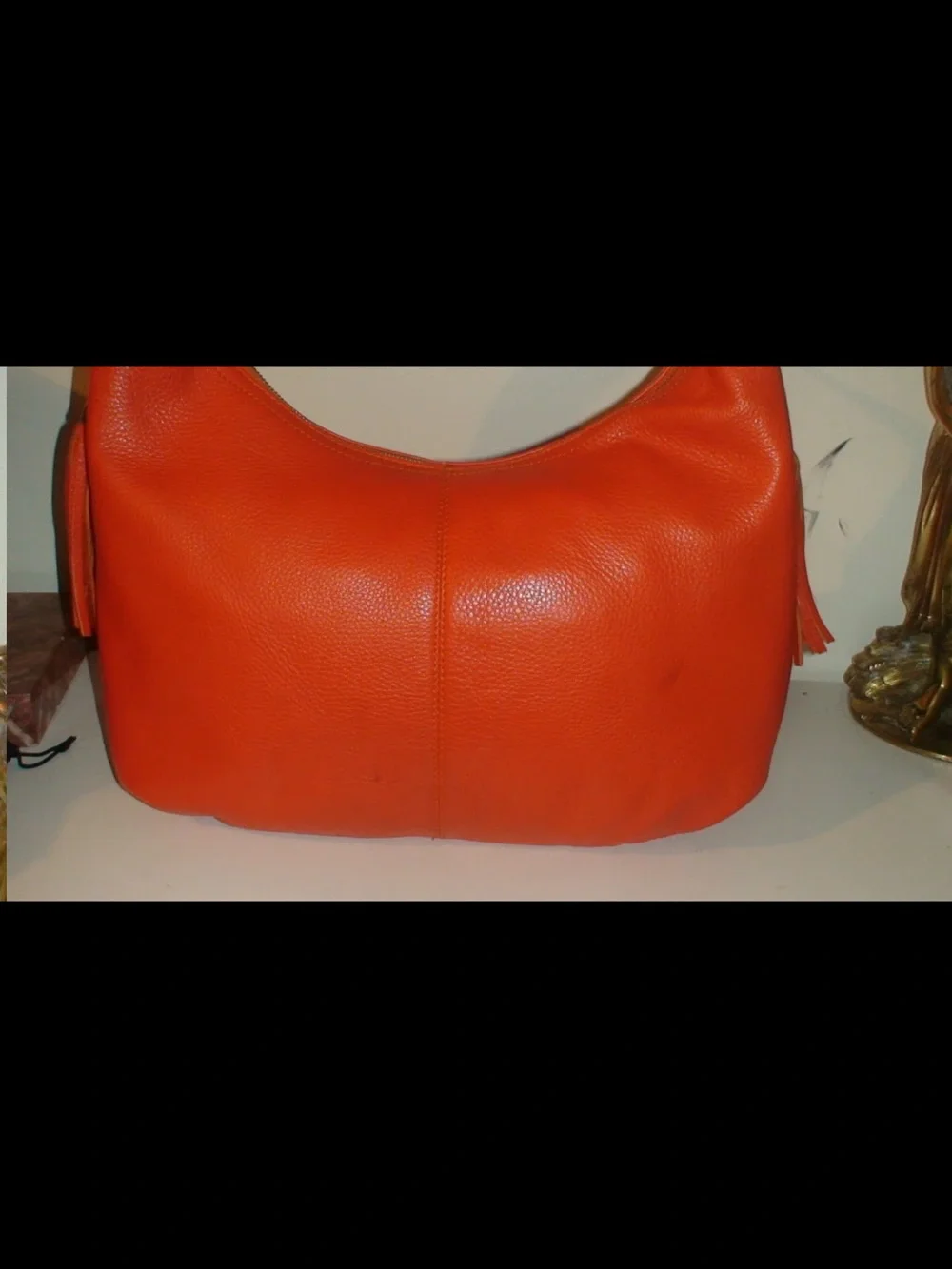 Mulberry Orange Leather Hobo Bag with Tassels and Gold Emblem